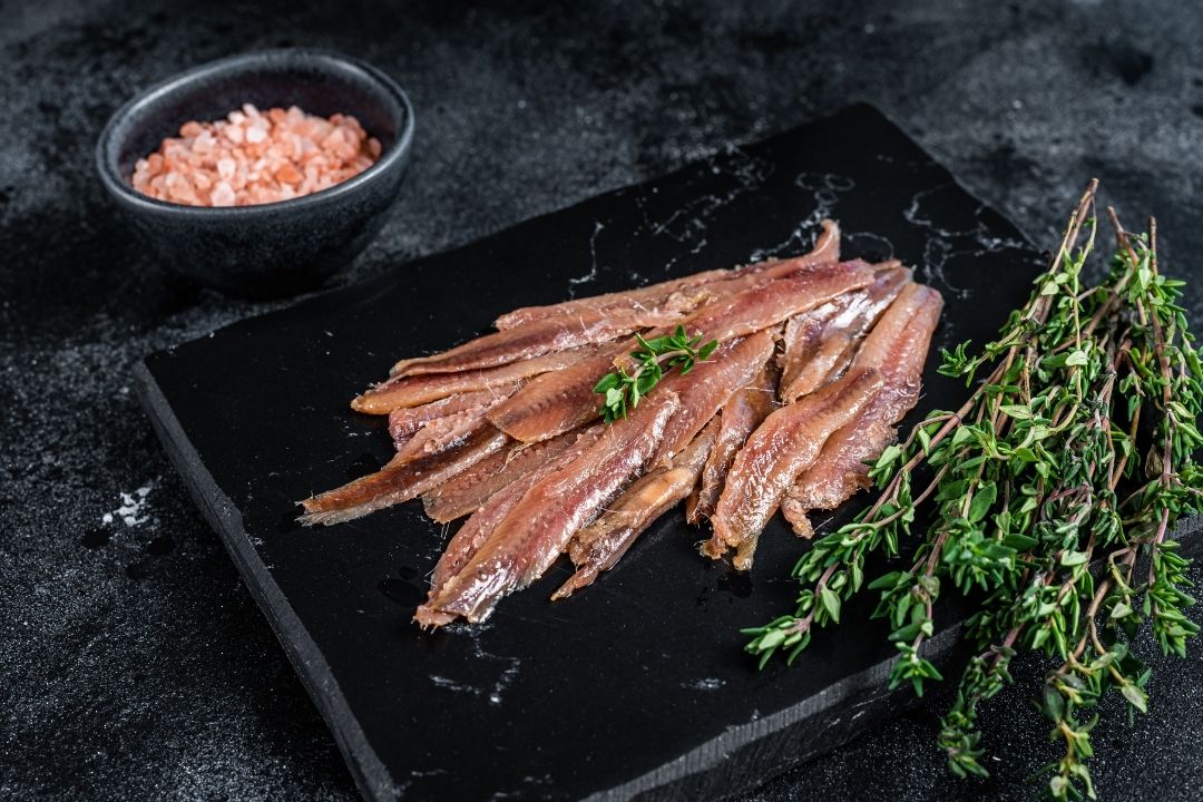 Productos gourmet: filetes de anchoa premium, sabor intenso, inspiración Hoces del Cabriel.